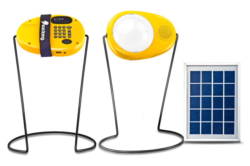 Front and back view of the Sun King Boom solar lantern, next to a solar panel.